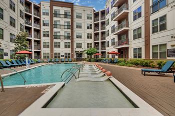 Alton optimist park apartments in charlotte, north carolina pool with lounge chairs